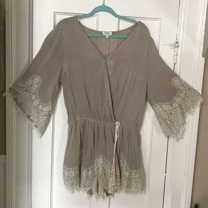 Umgee Tan Large romper . Never worn